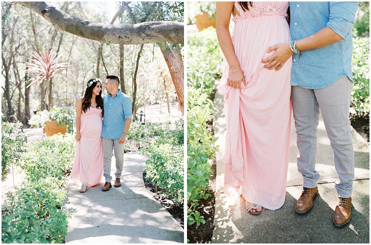 A couple walks down a tree lined path during their Malibu maternity session.