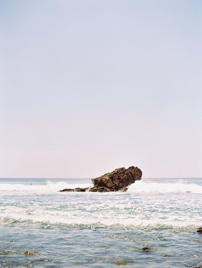 The rocky coastline of Malibu California on film by portrait photographer Daniele Rose