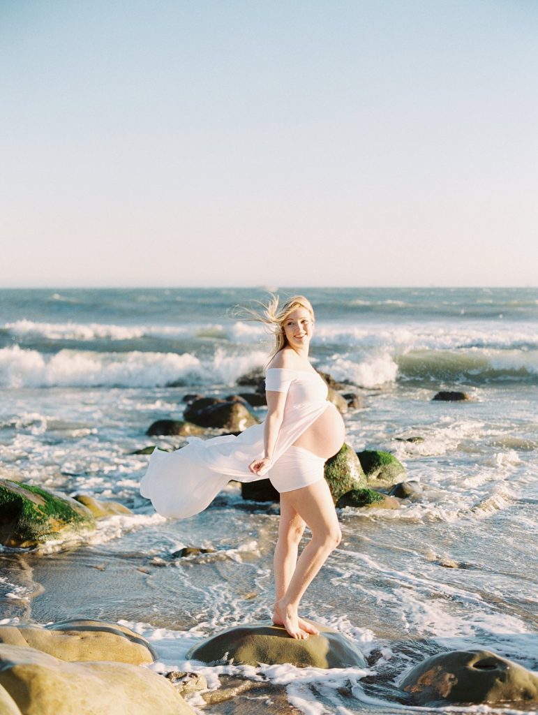 Maternity portrait of an expectant mother on the beach in Santa Barbara