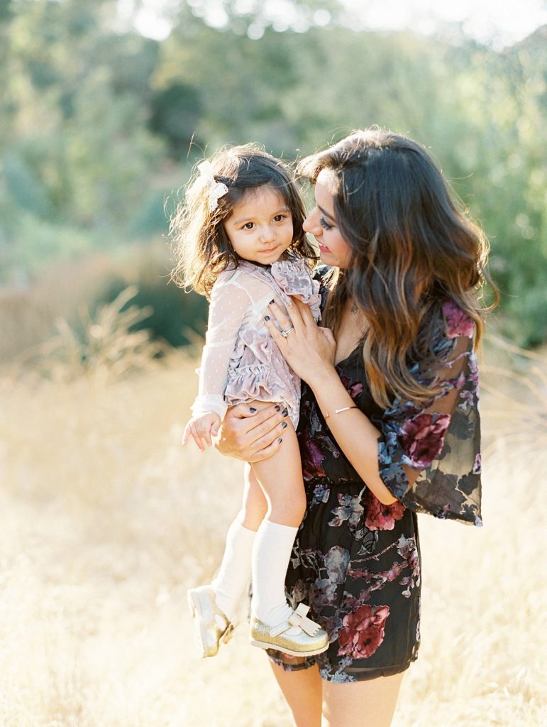 Thousand Oaks child portrait photographer Daniele Rose photographs a mother and daughter in a golden field