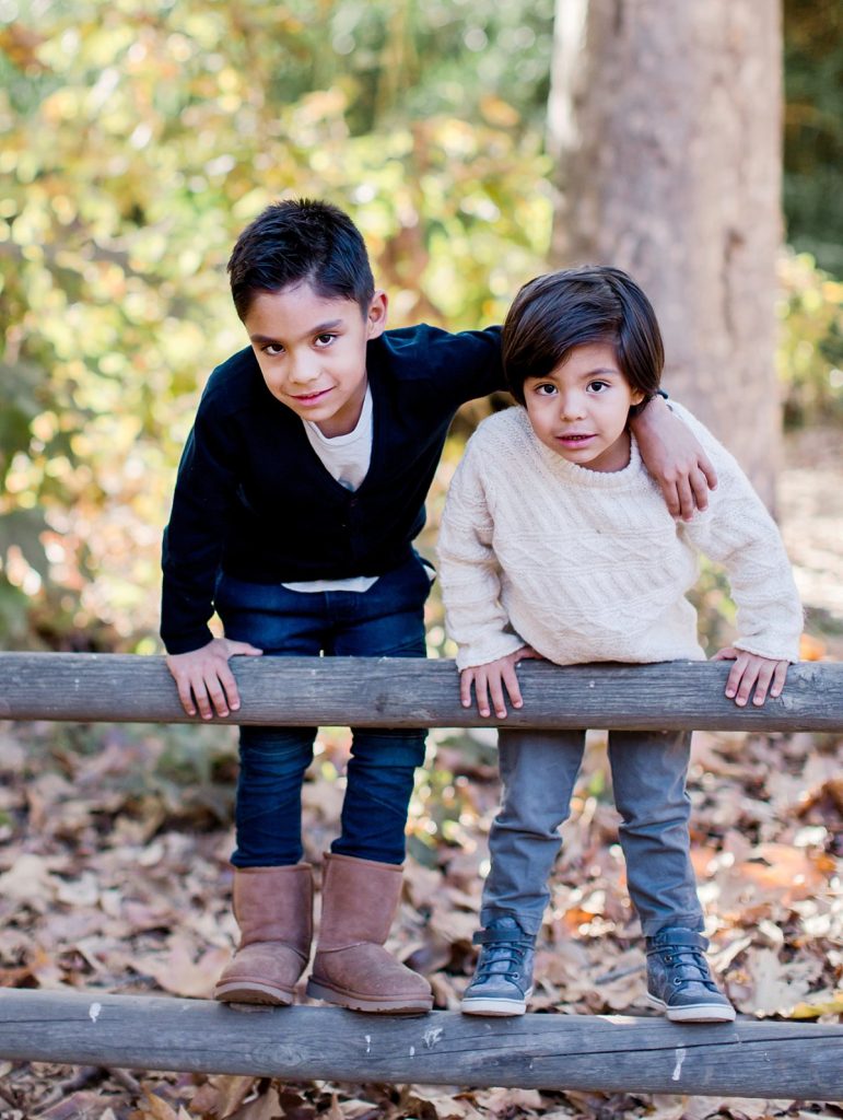 Two brothers smile for the camera during their Ventura children's portrait session