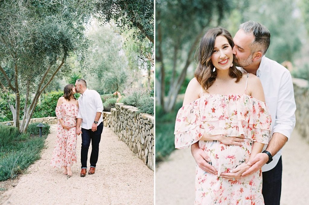A couple kisses in the herb garden during their Ojai Valley Inn maternity session with photographer Daniele Rose.