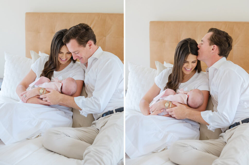 New parents snuggle with their newborn baby.