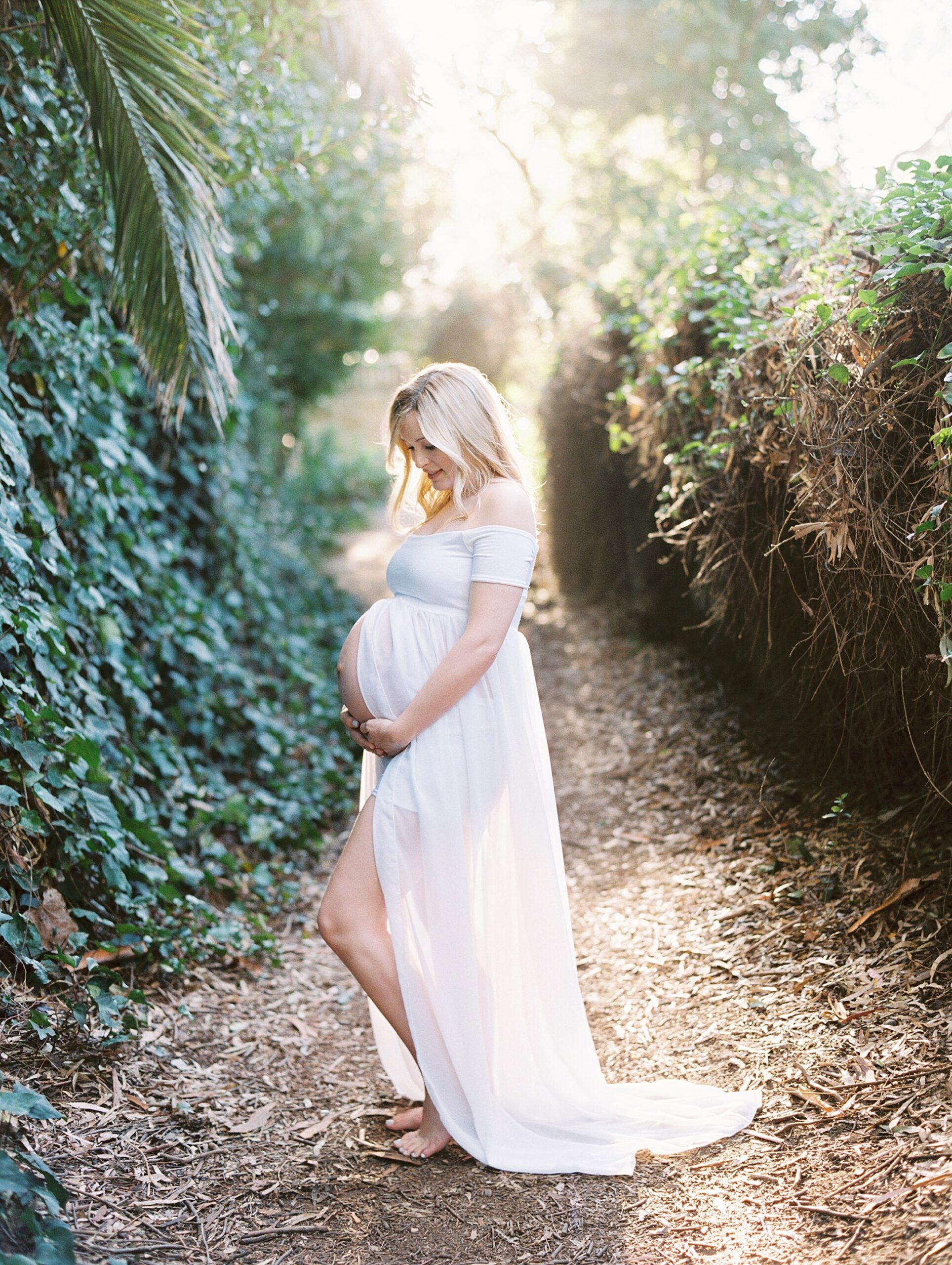 Montecito photographer Daniele Rose photographs a mother to be during her maternity session at Hammond's Beach in Montecito.