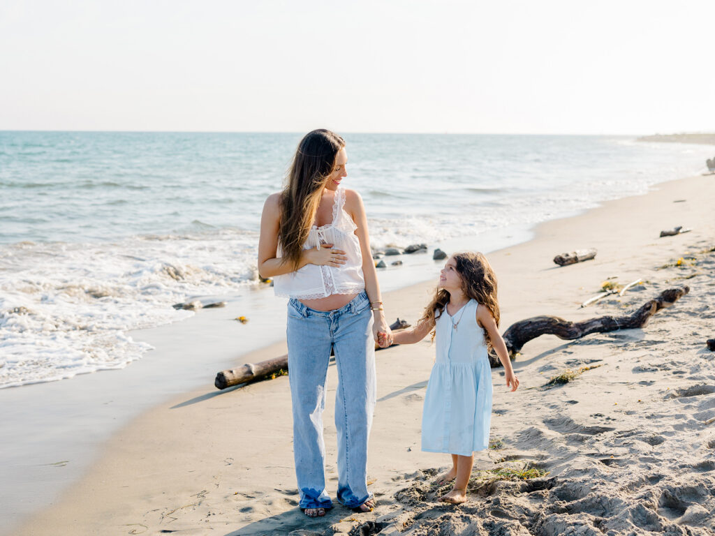 Mother and daughter holding hands during a Santa Barbara family photography session
